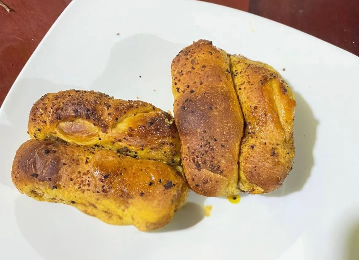 Spanish bread torn open
