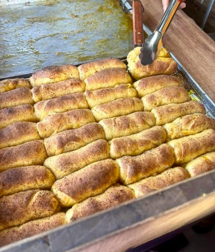 Trays of fresh Pan De Tekwat Spanish bread